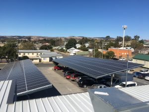 Solar panels on store roof tops are focus with eight systems up and running, and more on the way.